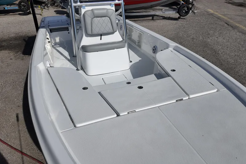 Slide: The Image of 2026 Blazer PureBay 2400 boat interior with seating and storage compartments. - 7