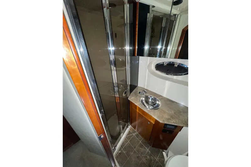 Slide: The Image of Luxurious bathroom in 2008 CRUISERS INC 415 Express Motoryacht with modern fixtures. - 14