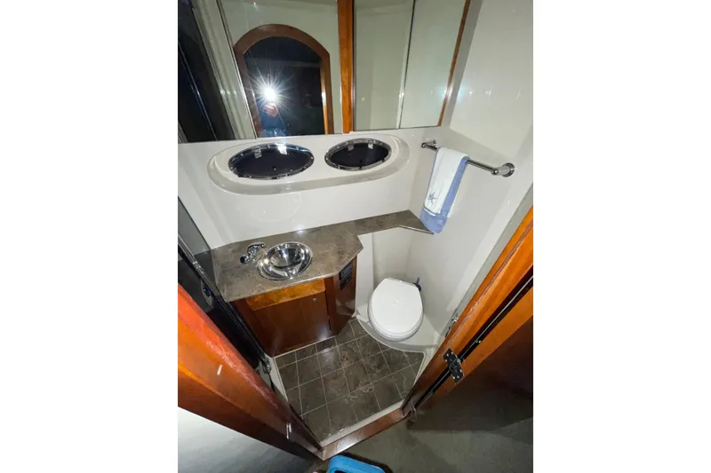 Slide: The Image of Luxurious bathroom in 2008 CRUISERS INC 415 Express Motoryacht with modern fixtures. - 15