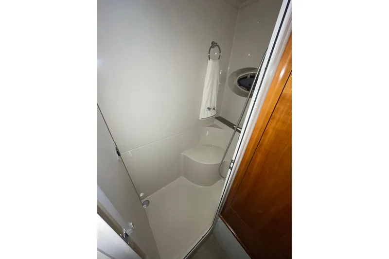 Slide: The Image of Bathroom interior of 2008 CRUISERS INC 415 Express Motoryacht, featuring shower and towel ring. - 20