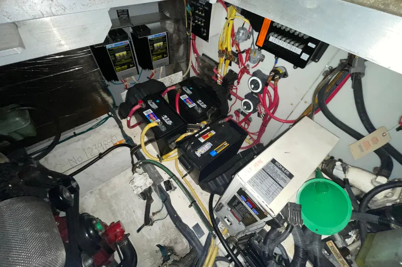 Slide: The Image of Engine room of 2008 Cruisers Yachts 415 Express Motoryacht with batteries and wiring. - 38