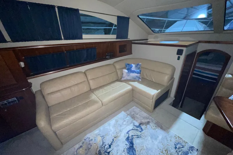 Slide: The Image of Luxurious interior of 2008 CRUISERS INC 415 Express Motoryacht with beige leather seating. - 28