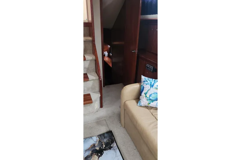 Slide: The Image of Interior of 2008 CRUISERS INC 415 Express Motoryacht with stairs and seating area. - 33