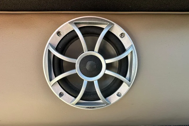 Slide: The Image of 2024 Ranger Reata 200C speaker with metallic grille on beige panel. - 18