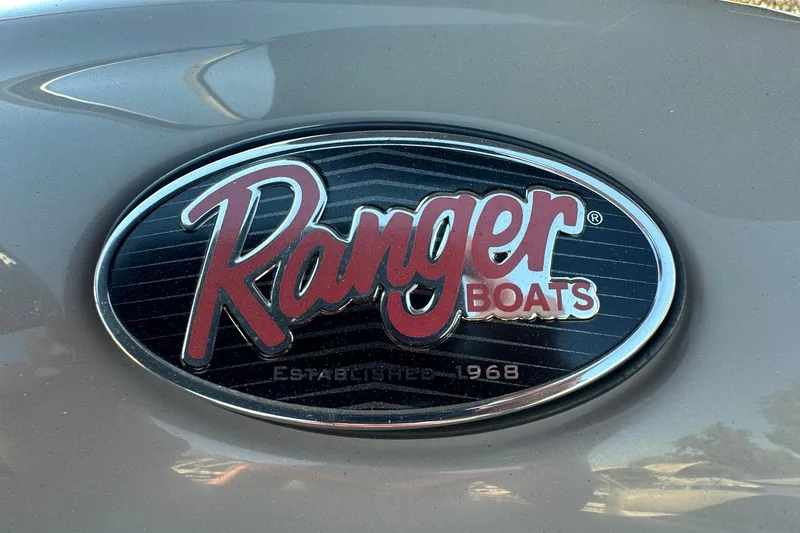 Slide: The Image of Ranger Boats logo on 2024 Reata 200C, established 1968, oval design. - 19