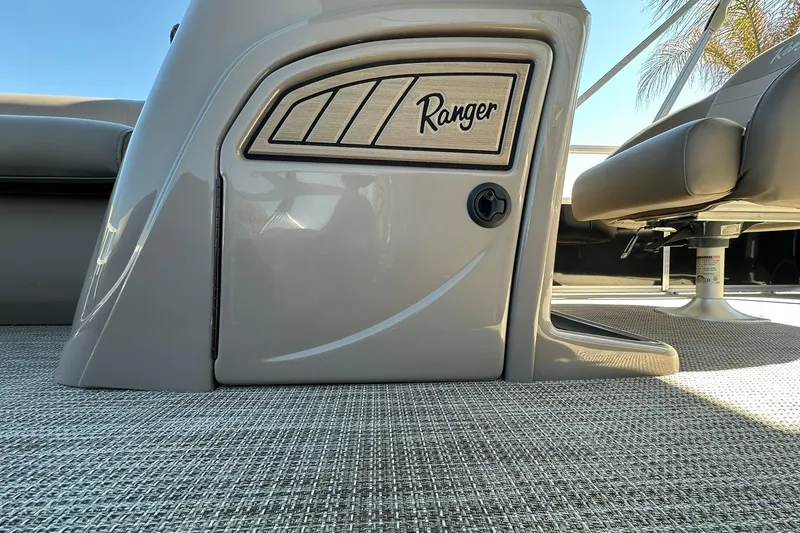 Slide: The Image of 2024 Ranger Reata 200C boat interior with sleek design and comfortable seating. - 22