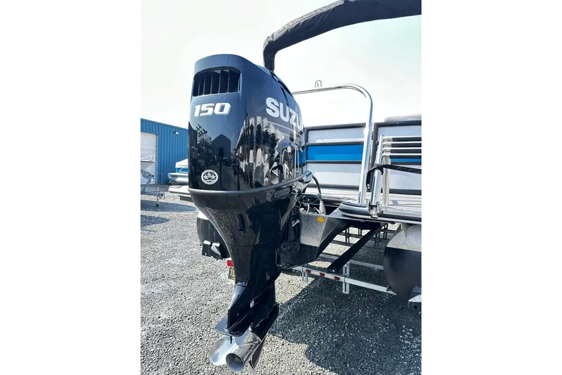 Slide: The Image of 2025 Bentley Pontoons 223 Bolt Tri Toon with Suzuki 150 outboard motor. - 15