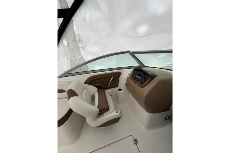 Slide: The Image of 2016 Chaparral 264 Sunesta boat bathroom with sink and toilet. - 13
