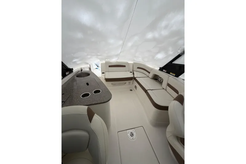 Slide: The Image of 2016 Chaparral 264 Sunesta boat thruster detail, showcasing propeller in hull. - 14