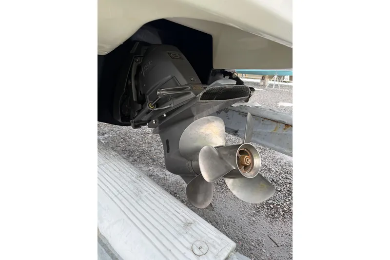 Slide: The Image of 2016 Chaparral 264 Sunesta boat propeller and drive system on trailer. - 16