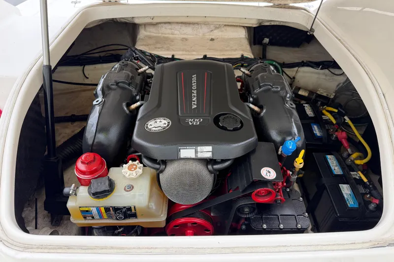 Slide: The Image of Engine compartment of 2016 Chaparral 264 Sunesta with Volvo Penta V8-300 motor. - 18