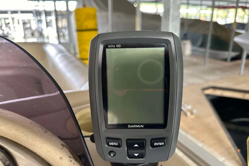 Slide: The Image of Garmin Echo 100 fishfinder on 2013 SunCatcher V322 RC boat dashboard. - 11