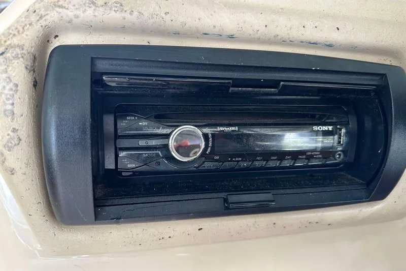 Slide: The Image of Sony stereo system in a 2013 SunCatcher V322 RC boat dashboard. - 19