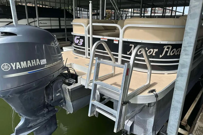 Slide: The Image of 2013 SunCatcher V322 RC pontoon boat with Yamaha outboard motor in marina. - 20