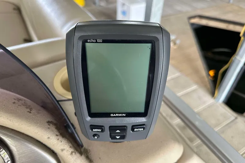 Slide: The Image of Garmin Echo 100 fishfinder on 2013 SunCatcher V322 RC boat dashboard. - 4