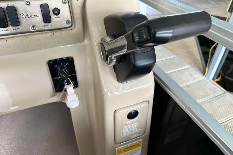 Slide: The Image of 2013 SunCatcher V322 RC boat control panel with ignition and throttle lever. - 8