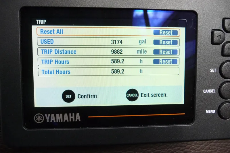 Slide: The Image of Yamaha trip monitor display on 2017 Ranger Tugs R-23, showing fuel and distance data. - 26
