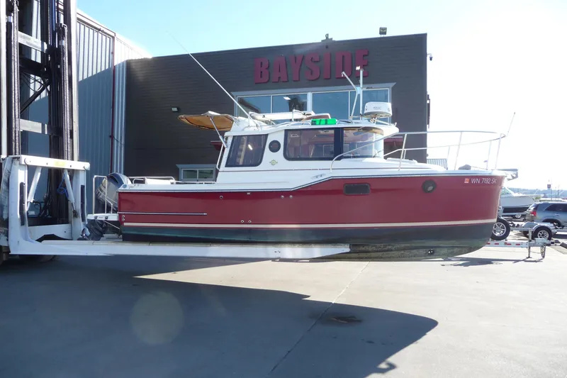 Slide: The Image of 2017 Ranger Tugs R-23 boat lifted at Bayside marina. - 5