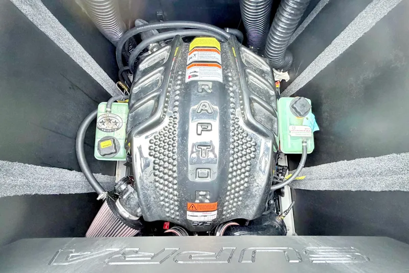 Slide: The Image of 2023 Supra SE 550 engine compartment with Raptor branding and components. - 17