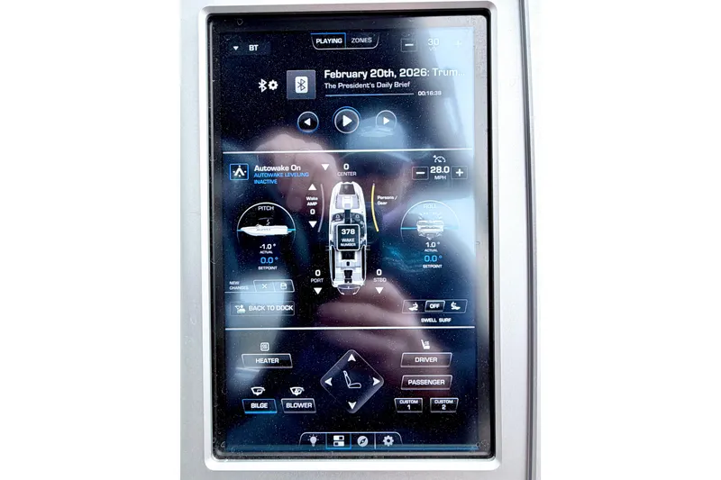 Slide: The Image of Touchscreen display of 2023 Supra SE 550 boat control panel with navigation and audio settings. - 45
