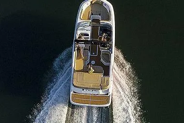 Slide: The Image of 2024 Bayliner VR6 Bowrider I/O interior with seating and console, featuring sleek design elements. - 4