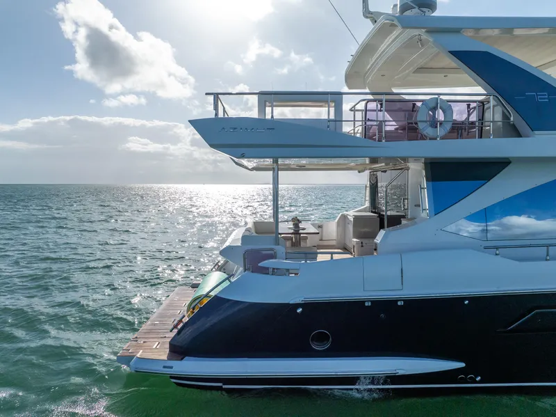 Slide: The Image of Azimut Fly 72 yacht, 2016 model, cruising on open water under a bright sky. - 13