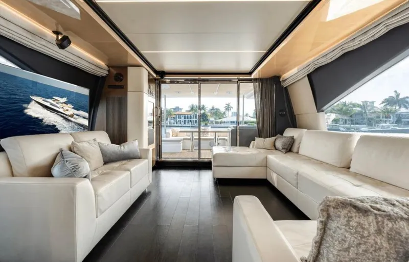 Slide: The Image of Luxurious interior of 2016 Azimut Fly 72 yacht with elegant white sofas and scenic views. - 15