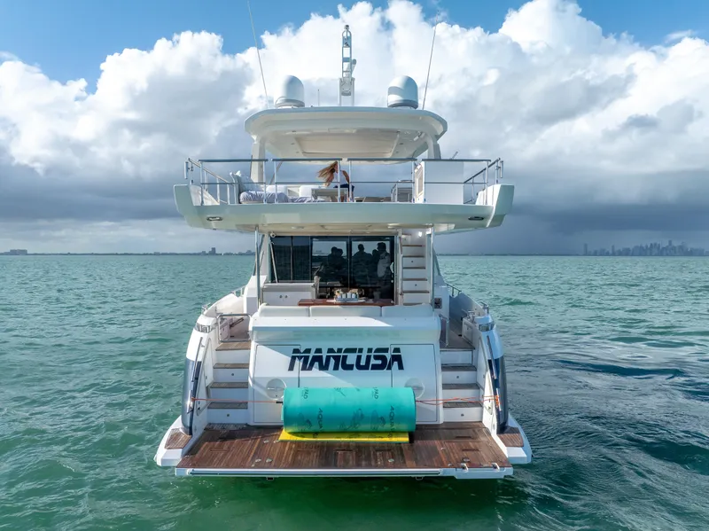 Slide: The Image of Azimut Fly 72 yacht, 2016 model, cruising on open water under cloudy skies. - 21