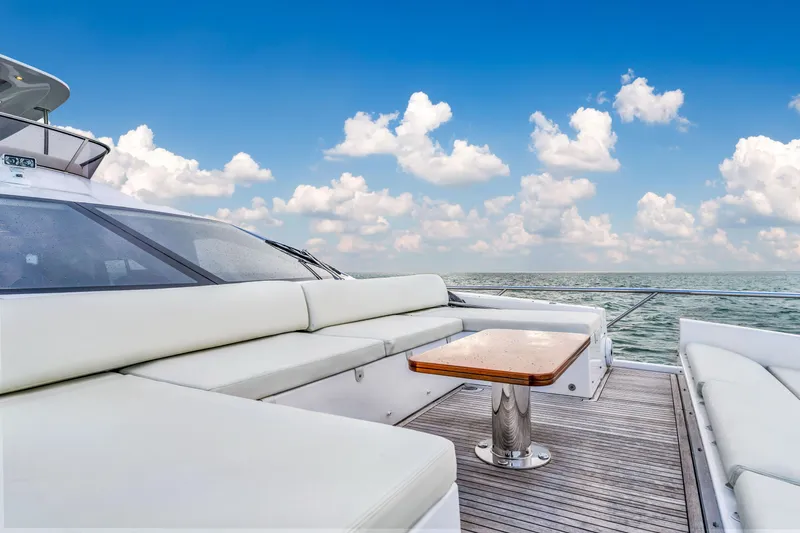 Slide: The Image of Azimut Fly 72 yacht deck with white seating and ocean view, 2016 model. - 23