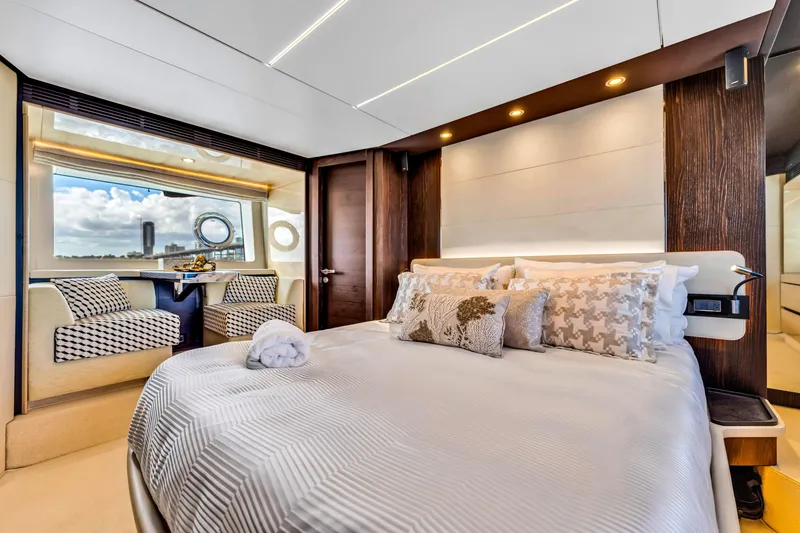 Slide: The Image of Luxurious bedroom interior of 2016 Azimut Fly 72 yacht with elegant decor and large window view. - 31
