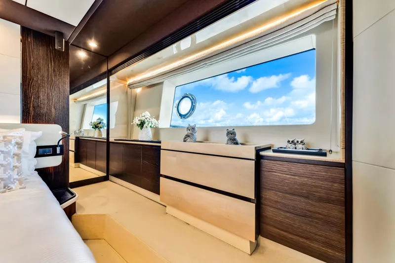 Slide: The Image of Luxurious interior of 2016 Azimut Fly 72 yacht with elegant furnishings and large window view. - 32