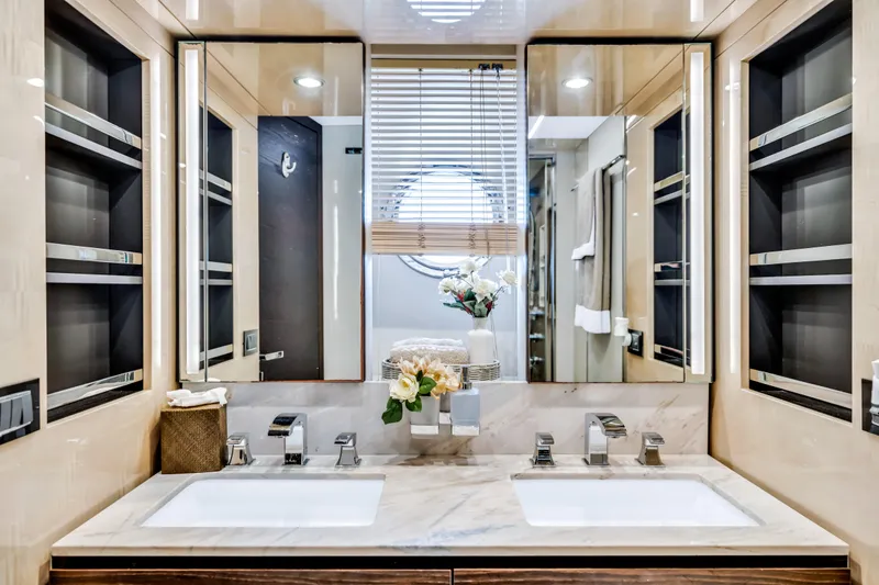 Slide: The Image of Luxurious bathroom in 2016 Azimut Fly 72 yacht with dual sinks and elegant decor. - 36