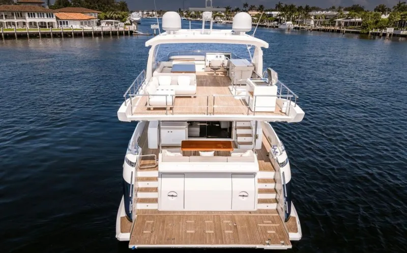 Slide: The Image of Azimut Fly 72 yacht, 2016 model, docked on a serene waterfront. - 7