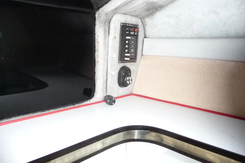Slide: The Image of 1989 Baja 280 Sportfish cabin interior with control panel and speaker. - 26