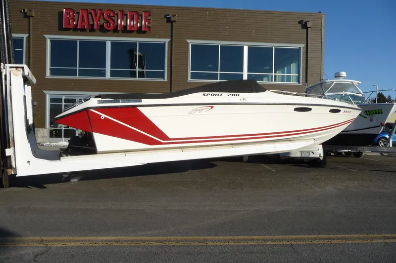 Slide: The Image of 1989 Baja 280 Sportfish boat displayed outside Bayside building. - 6