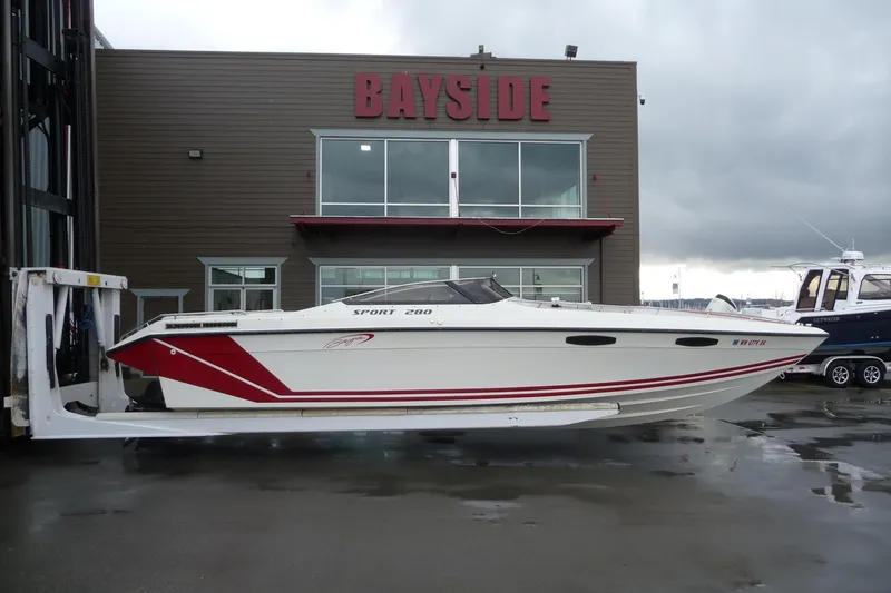 Slide: The Image of 1989 Baja 280 Sportfish boat displayed at Bayside marina. - 8