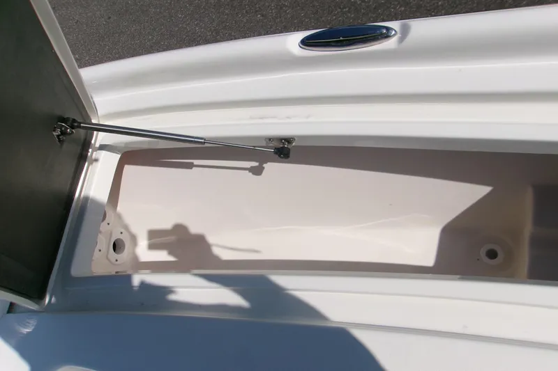 Slide: The Image of Open storage compartment on 2026 Key West 210 Bay Reef boat. - 14