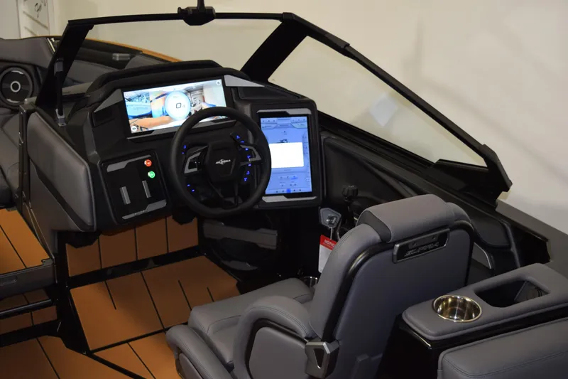 Slide: The Image of 2026 Supra SL 550 boat interior with advanced dashboard and steering controls. - 10