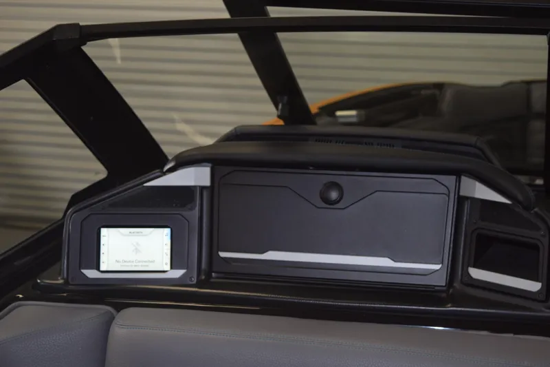 Slide: The Image of 2026 Supra SL 550 dashboard with touchscreen and storage compartment. - 12