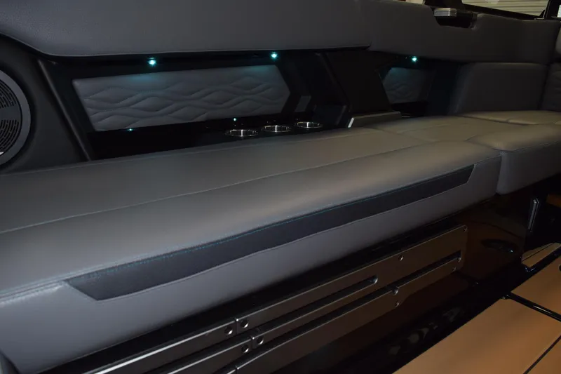 Slide: The Image of 2026 Supra SL 550 interior with sleek leather seating and ambient lighting. - 13