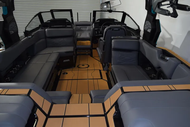 Slide: The Image of 2026 Supra SL 550 boat interior with luxurious seating and modern design. - 6
