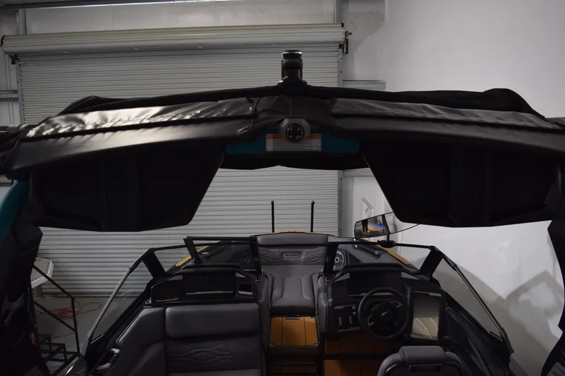 Slide: The Image of 2026 Supra SL 550 boat interior with advanced dashboard and seating. - 7