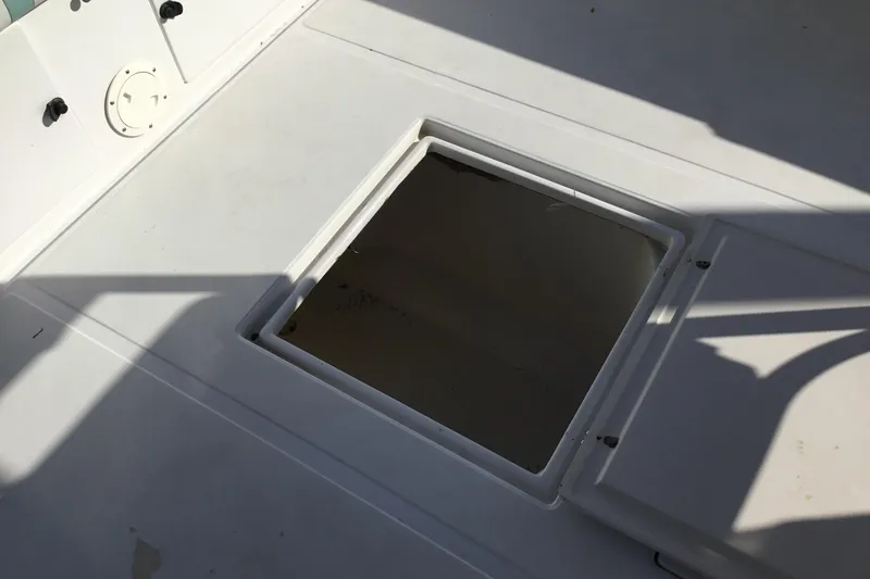 Slide: The Image of Open hatch on 2000 Jupiter 31 Center Console boat deck. - 36