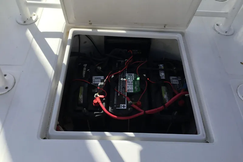 Slide: The Image of Battery compartment of a 2000 Jupiter 31 Center Console boat. - 46