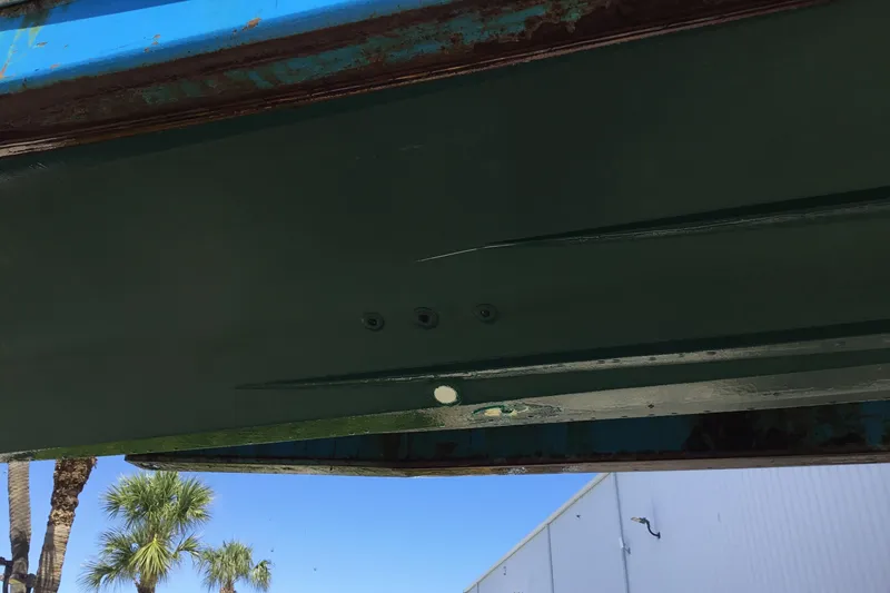Slide: The Image of Underside view of a 2000 Jupiter 31 Center Console boat hull. - 75