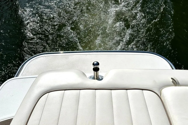 Slide: The Image of 2007 Cobalt 232 boat stern with water wake in sunlight. - 20