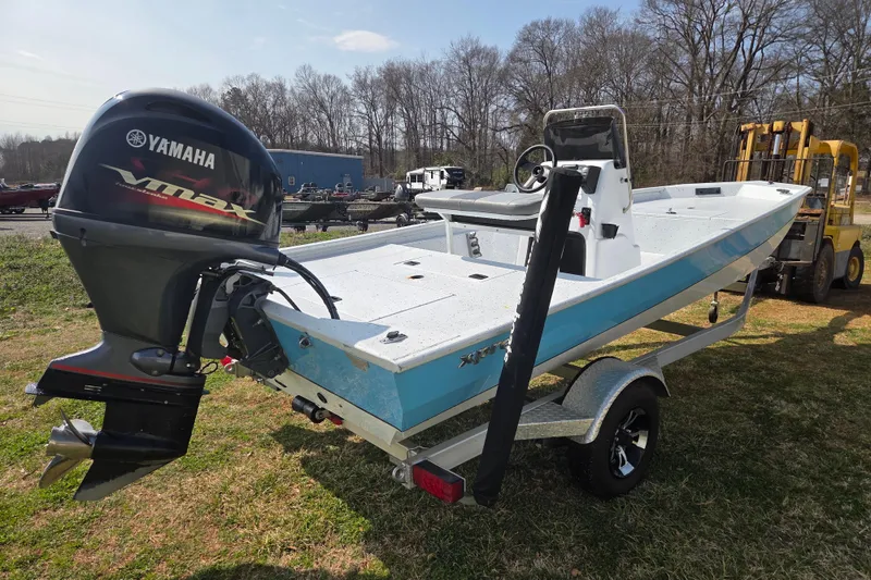 Slide: The Image of 2020 Xpress XP18CC boat with Yamaha VMAX engine on trailer, parked outdoors. - 4