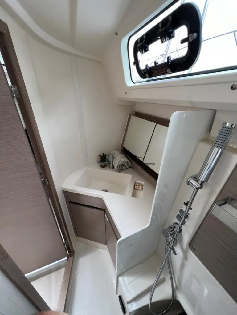 Slide: The Image of Modern bathroom in 2023 Hanse 388 yacht with shower and sink. - 26