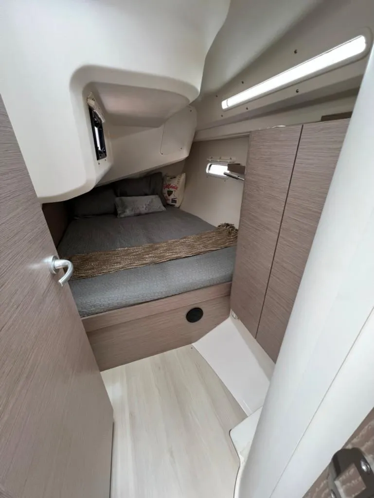 Slide: The Image of Interior cabin of 2023 Hanse 388 sailboat with modern wood finish. - 31