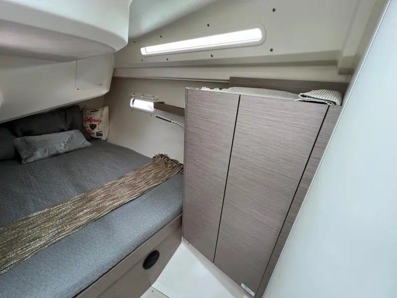 Slide: The Image of Modern interior cabin of 2023 Hanse 388 yacht with bed and storage. - 30
